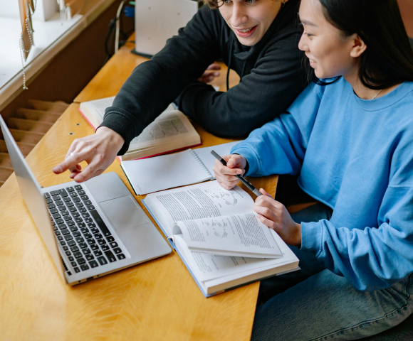 Two people studying